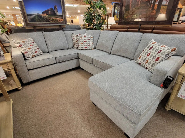 Decor-rest sectional with floating ottoman chaise.